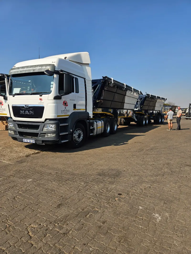 SteelBand Projects side tipper trucks parked side by side